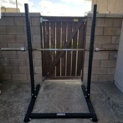Squat Rack W/ Olympic Barbell No Plates.