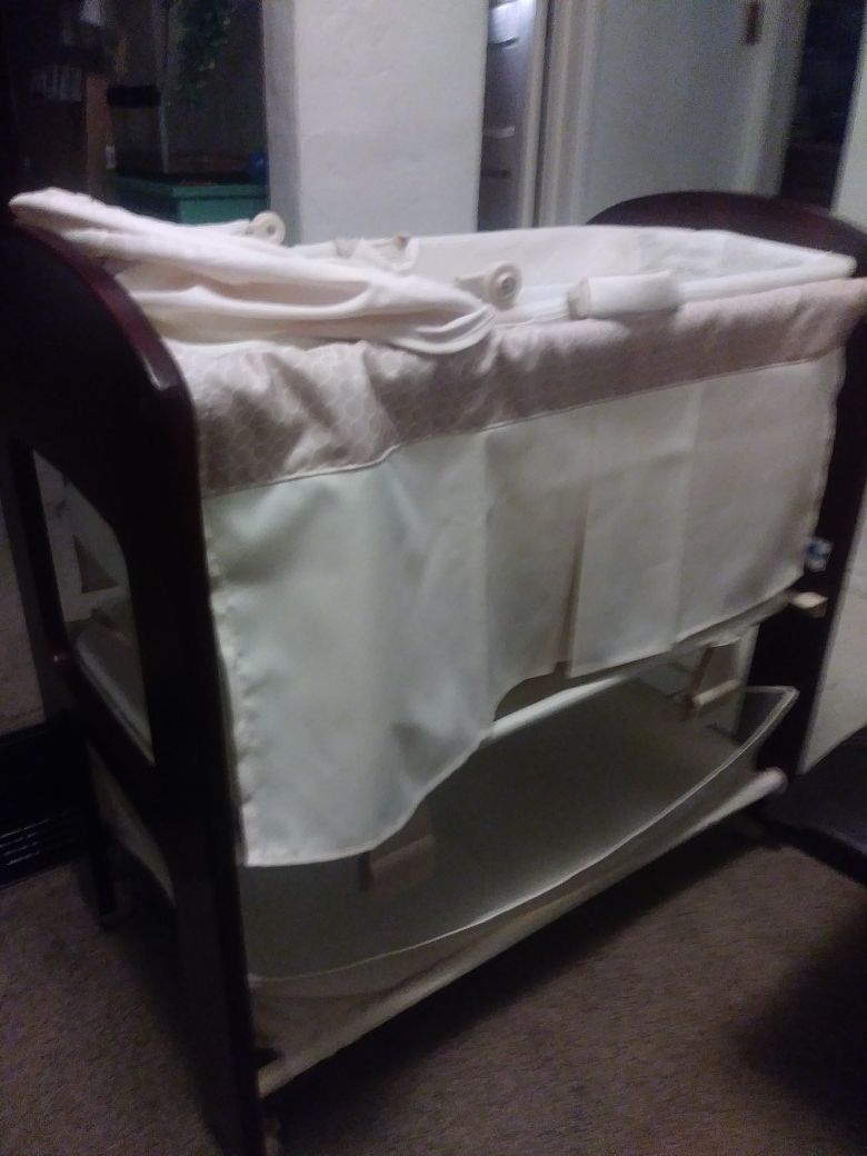 Baby wood bassinet with changing table