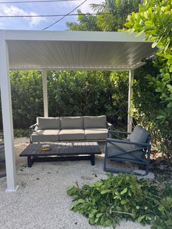 1 Outdoor Sofa + 2 Rocking Chairs – $4,100 Retail
