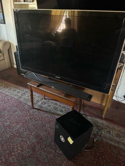 Samsung 55 inch Flat screen TV  soundbar and subwoofer