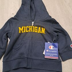 (6-9 months )Brand Champion : College Michigan zippered sweater New with tags