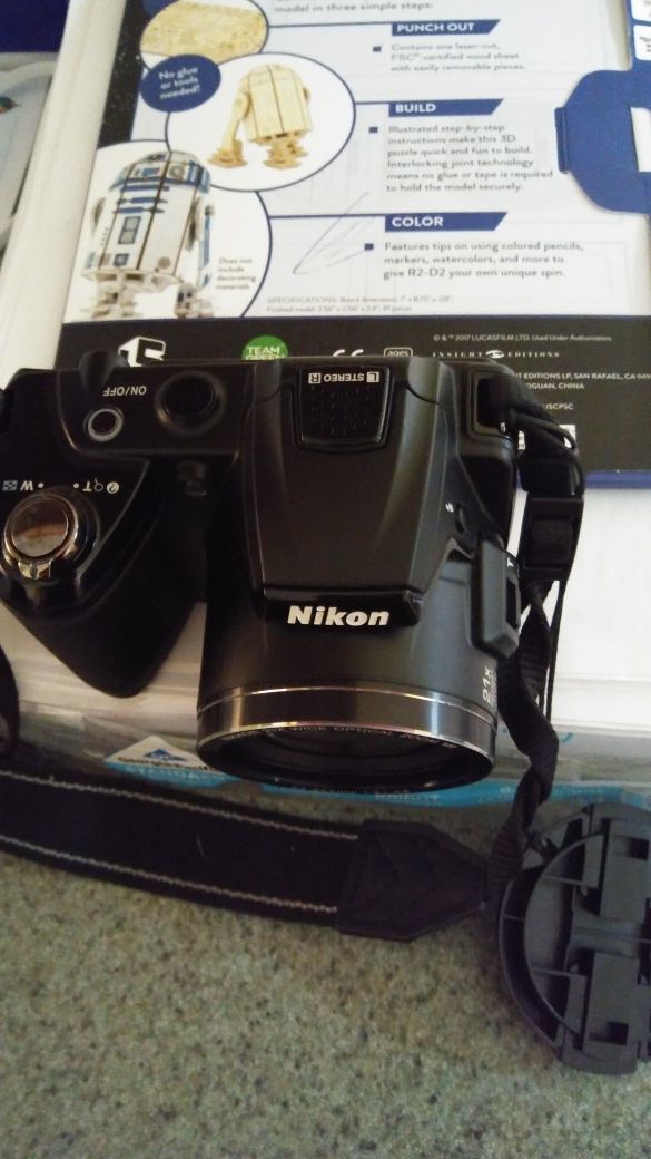 Camera nikon with bag and flash model cool pix l120 I am delivered