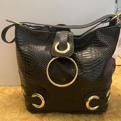 Reduced!!  Black purse.  New With Tags