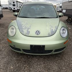 2006 volkswagen new beetle hatchback 2.5 2 door FWD automatic 189k miles runs and drive good only thing check engine light on not sure why ac heater w