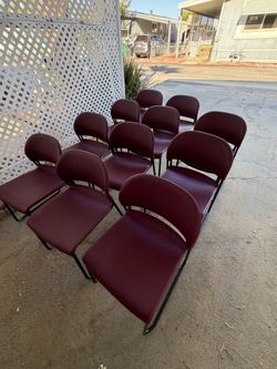 11 - Red HON stackable chairs