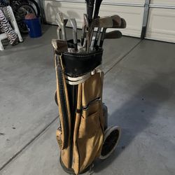 Antique Golf Clubs And Cart. 