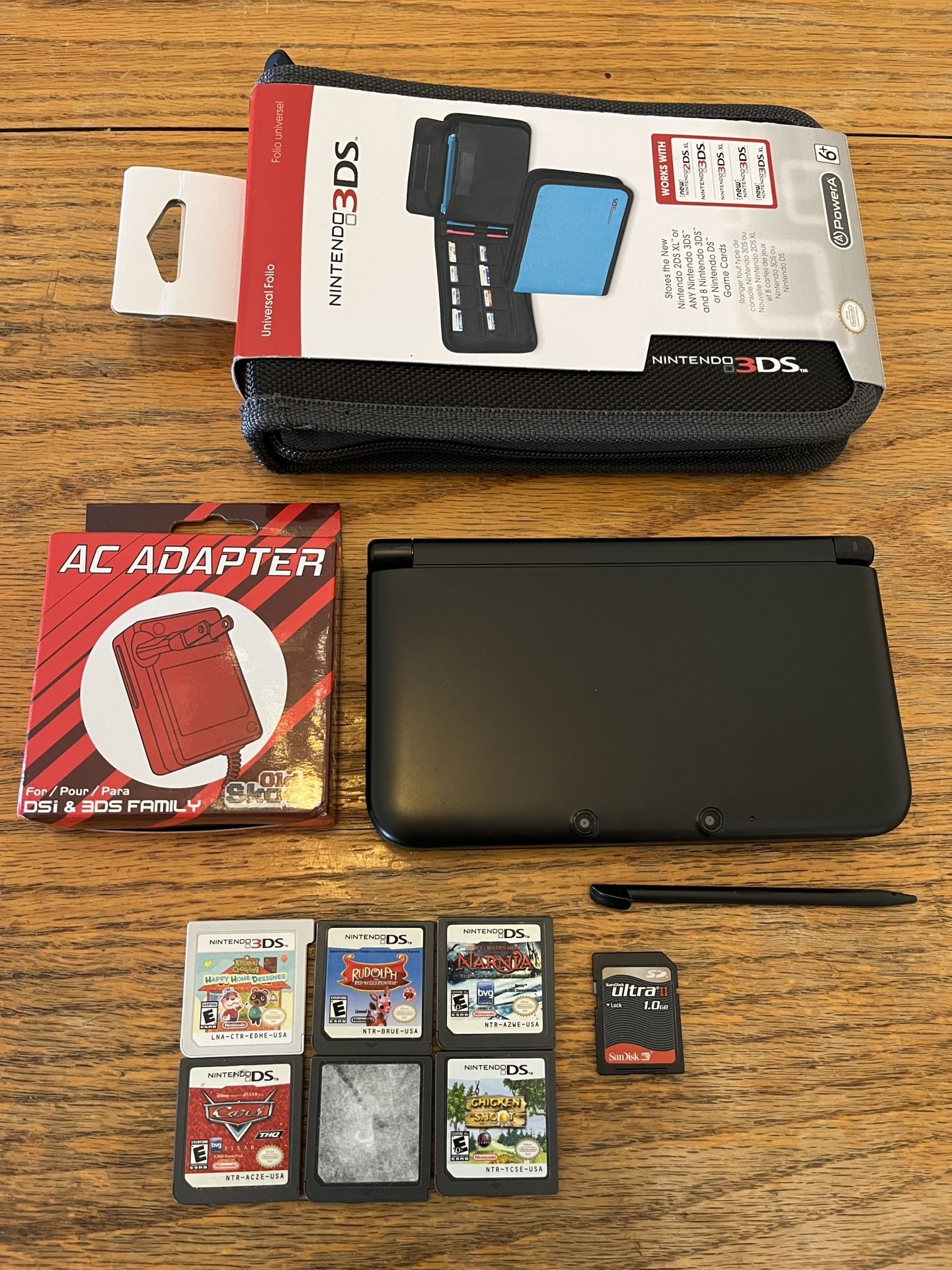 Like New Black Nintendo 3DS XL, New System Case, 1GB Memory, Charger & 6 Games Bundle