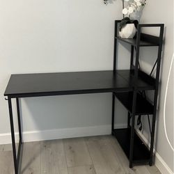 Black writing desk with shelves