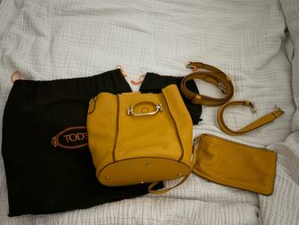 Tods mustard yellow bucket bag