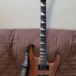 JACKSON DINKY JS32 SERIES DKA ARCH TOP ELECTRIC GUITAR IN  NATURAL COLOR WITH FLOYD ROSE TREMOLO. 