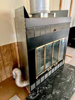 Free wood burning fireplace, could be used