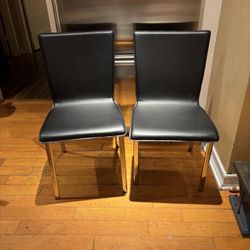 Black Leather Dining Chairs With Nickel Plated Legs CB2 - Set of 2 