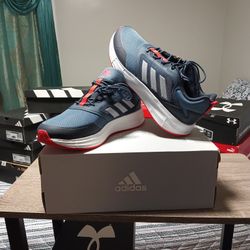 New With Tag  Adidas Size 10 Blue and Orange Only $35