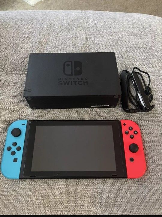 Nintendo Switch With 4 Games And And Extra Controller