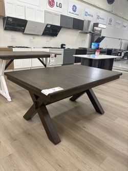 Solid wood brown dining table with middle extension