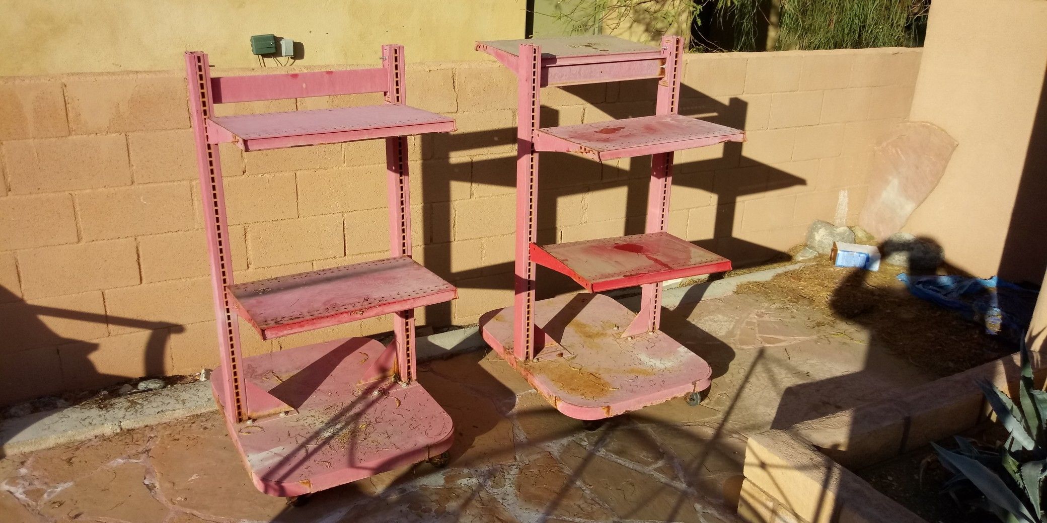 Metal shelves on rollers