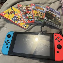 Nintendo Switch + Games