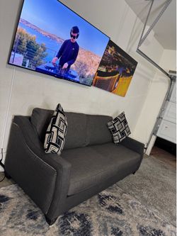 * Like New * Ashley furniture 1pc modular sofa ( Free Delivery )