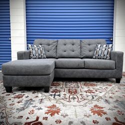 Gray Ashley HomeStores 85” Venaldi Sectional Sofa with Reversible Chaise