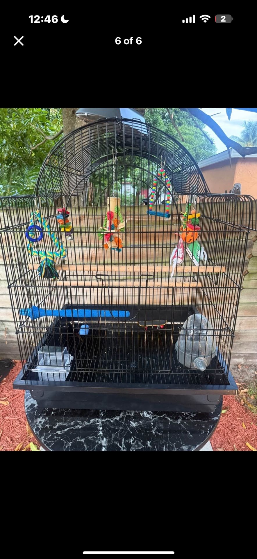 big birdcage with light and alot of Toys