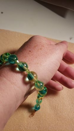 Turquoise and green glass bead bracelet with gold clasp
