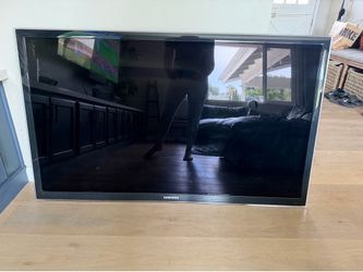 Samsung 55” led TV with Samsung sound bar and subwoofer
