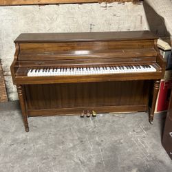 Upright Piano Few Dings It Has A Bench As Well 