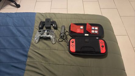 Nintendo switch bundle +5 games controllers and Zelda case