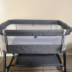 Baby bassinetd with wheels / rocking feature and storage