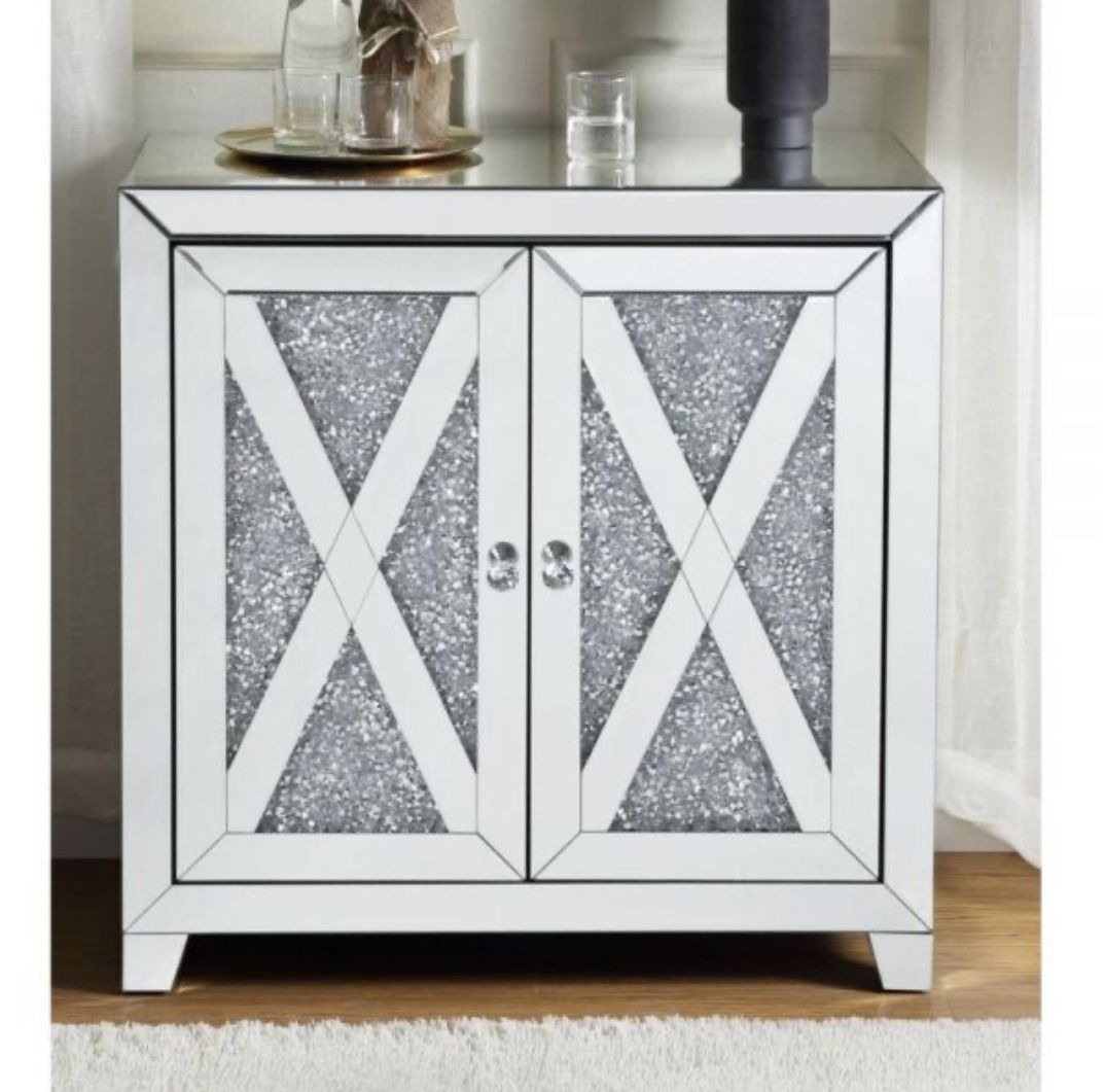 Assembled, Rectangular Console Table Storage: 2 Doors (No Shelves Inside) Features: Mirrored Finish w/Faux Diamonds Brand New In Box Firm Price $340