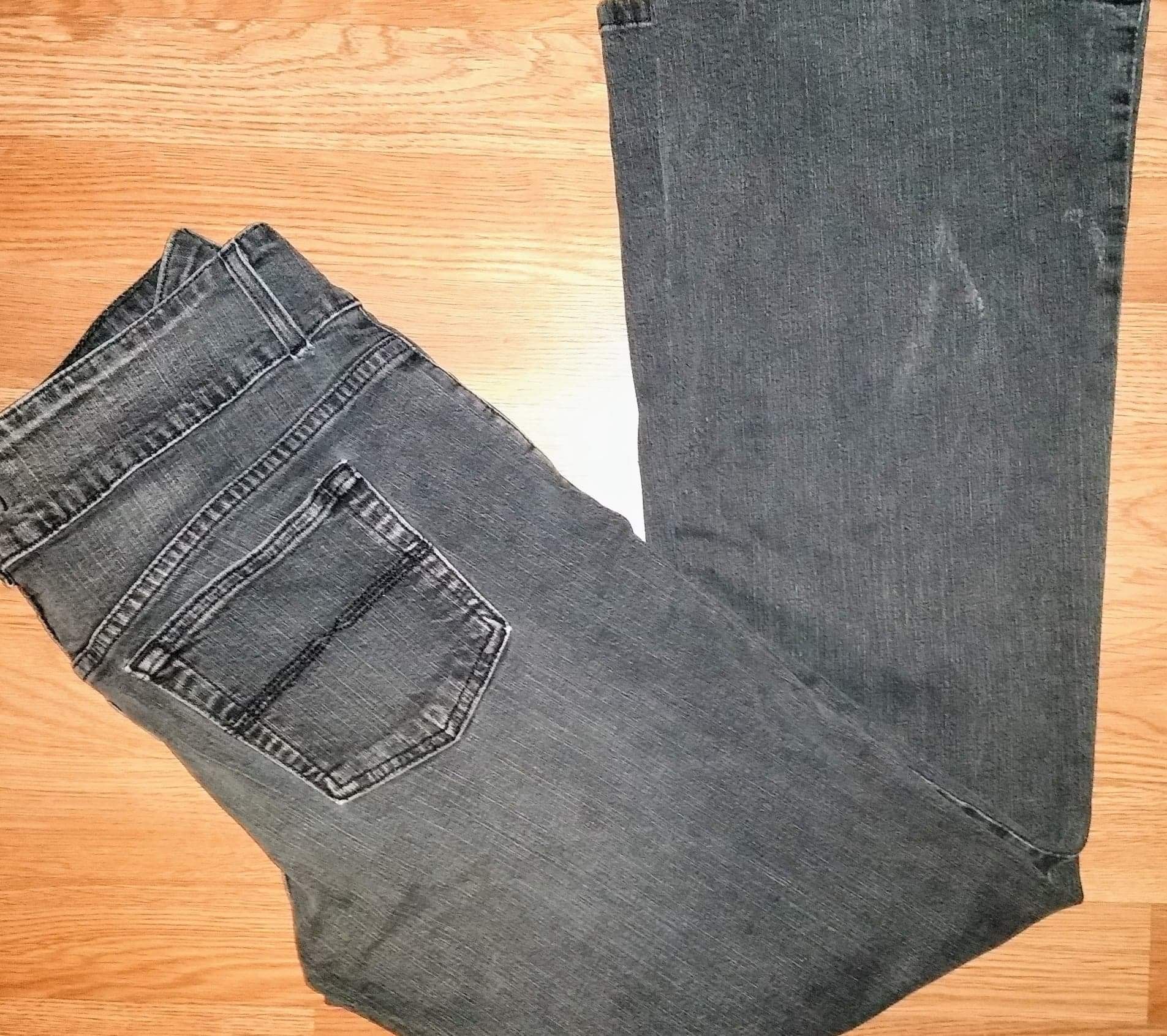 Faded black distressed boot cut jeans size 12R