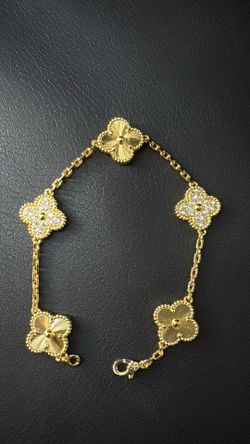 Gold plated flower bracelet $50