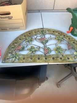 Decorative metal grape design