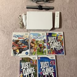 White Nintendo Wii + 5 Games
