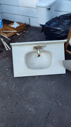 White Bathroom Vanity Sink with Gold Faucet