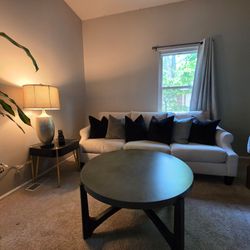 2 sofas with accent pillows