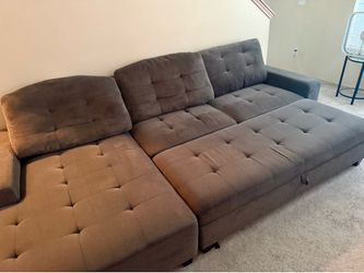 Large sectional couch with chaise and storage ottoman