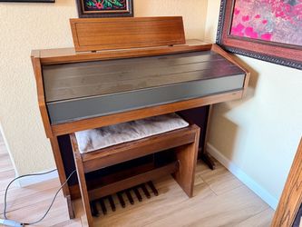 Vintage Electric Organ with Bench and sheet music