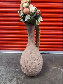 Large clay vase with decor