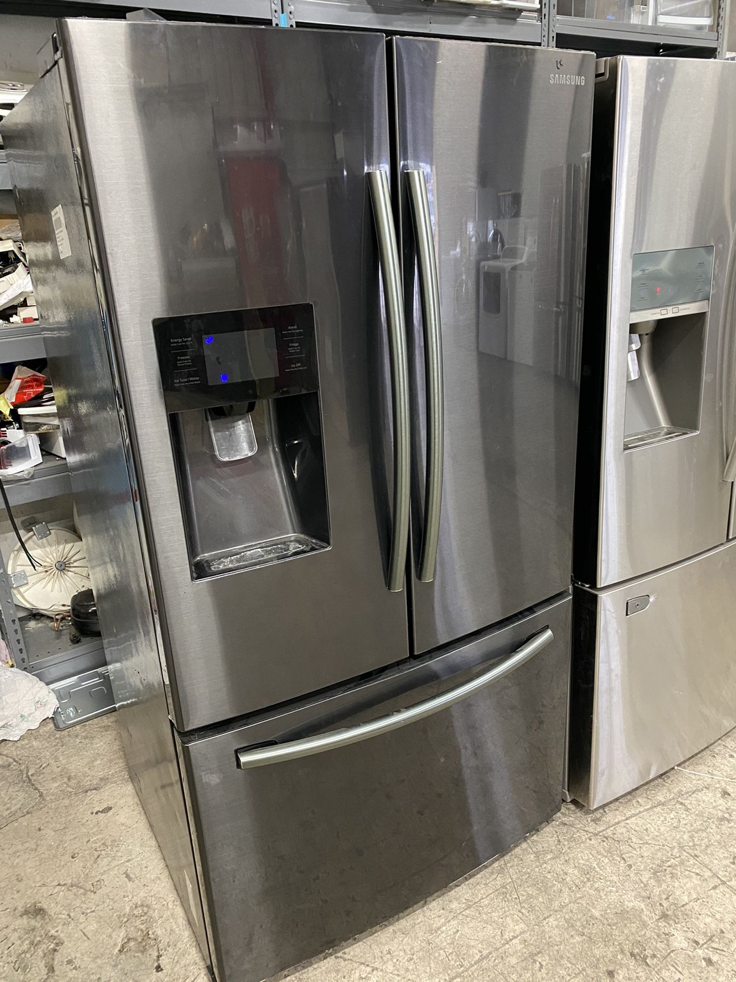 Black Stainless Samsung Frenchdoor water and ice can deliver