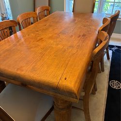 Solid wood table with 6 matching chairs