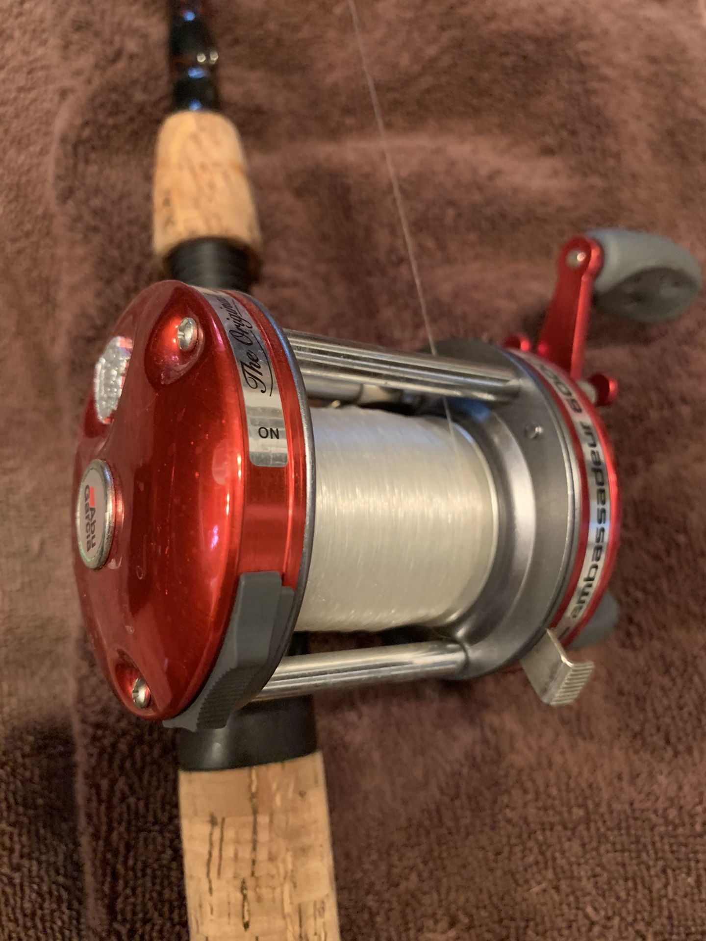 Used Abu Garcia Ambassadeur 6000 fishing reel with Berkeley Cherrywood