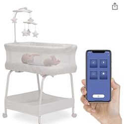 Delta Children SmartSleep Auto Glide Bassinet with Bluetooth And App