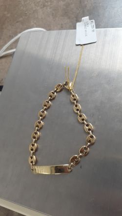 I'd bracelet 14k ,19.6 gr ,5"