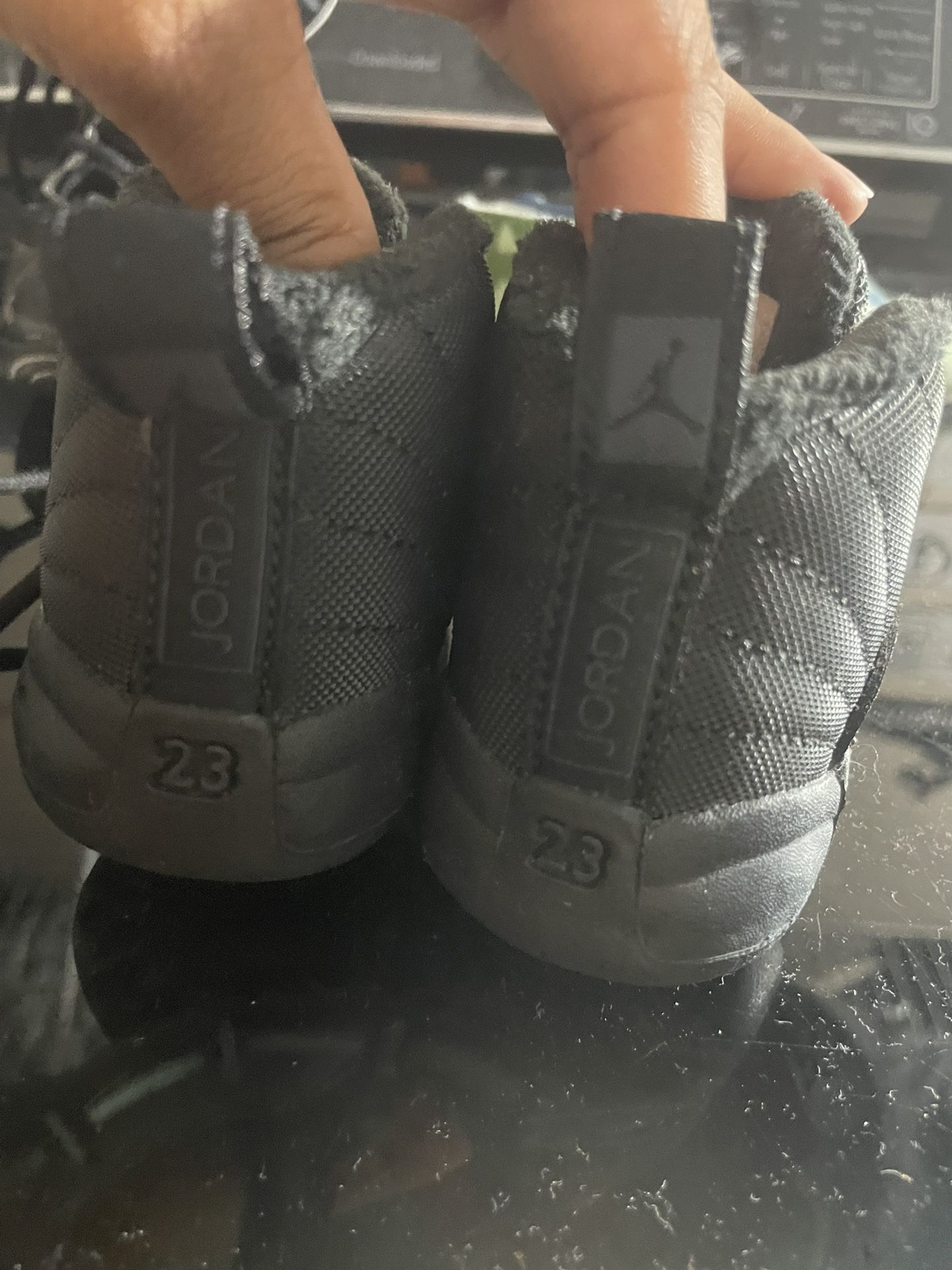 black infant size 2c jordan 12s