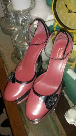 Guess heels...burgundy color with flower on the side...size 9 ...like new
