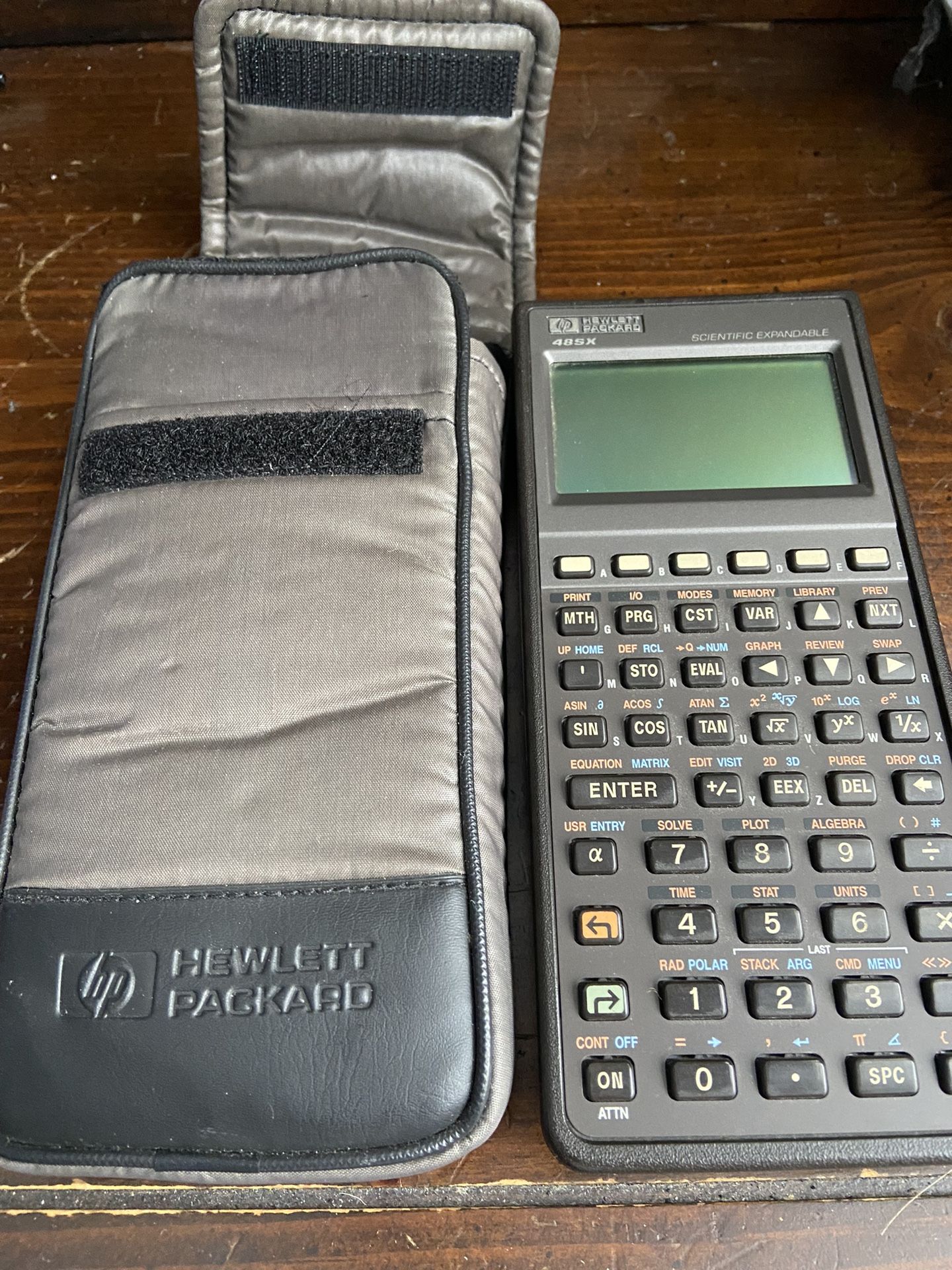 Hewlett Packard HP 48S Graphing Calculator Case 3 Manual used some wear. see pics