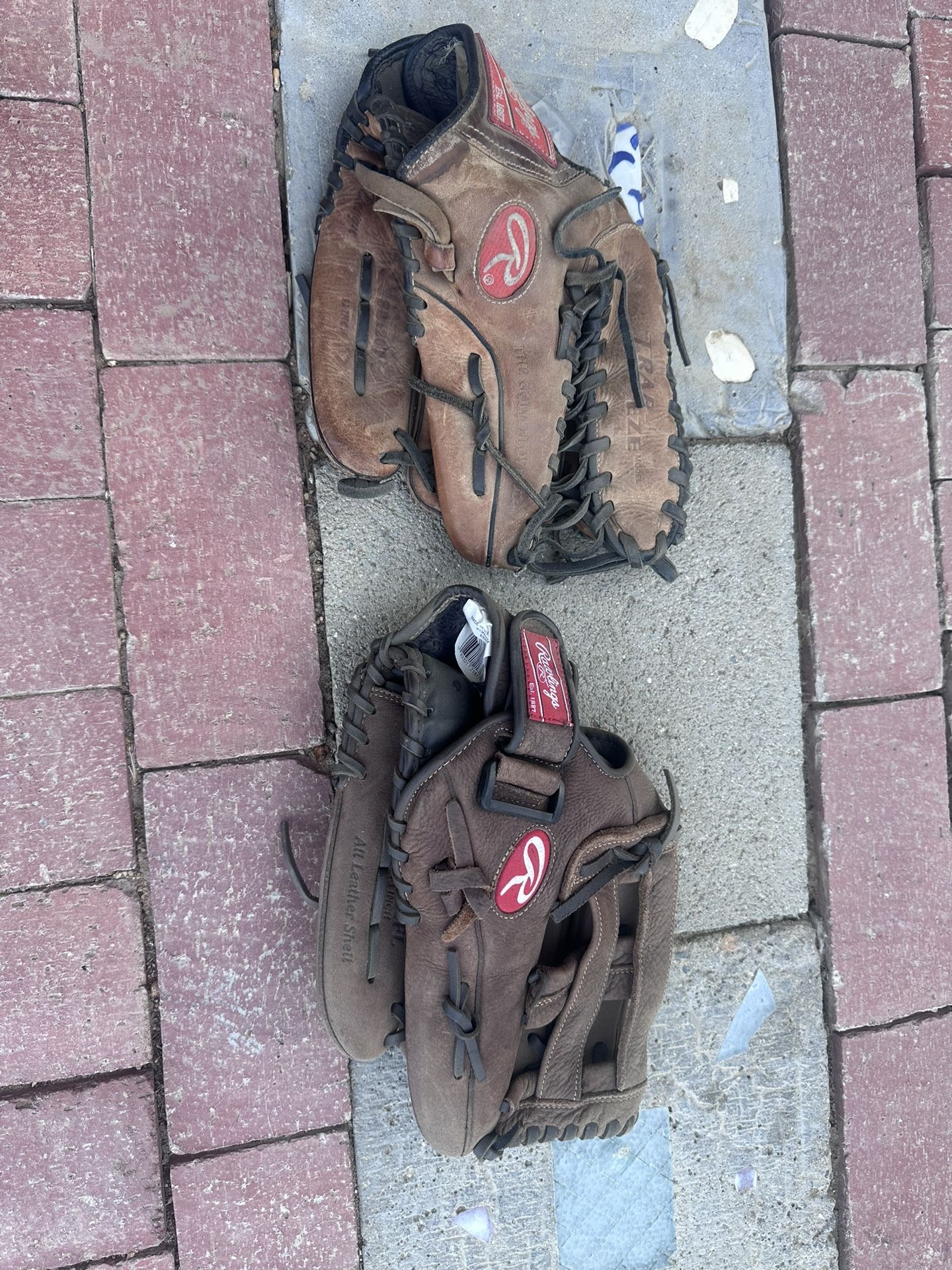 Pair Of Rawlings Gold Glove Series Adult Size