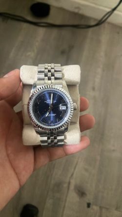 Blue face stamp Rolex