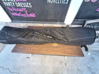 Skis, poles, boots and bag